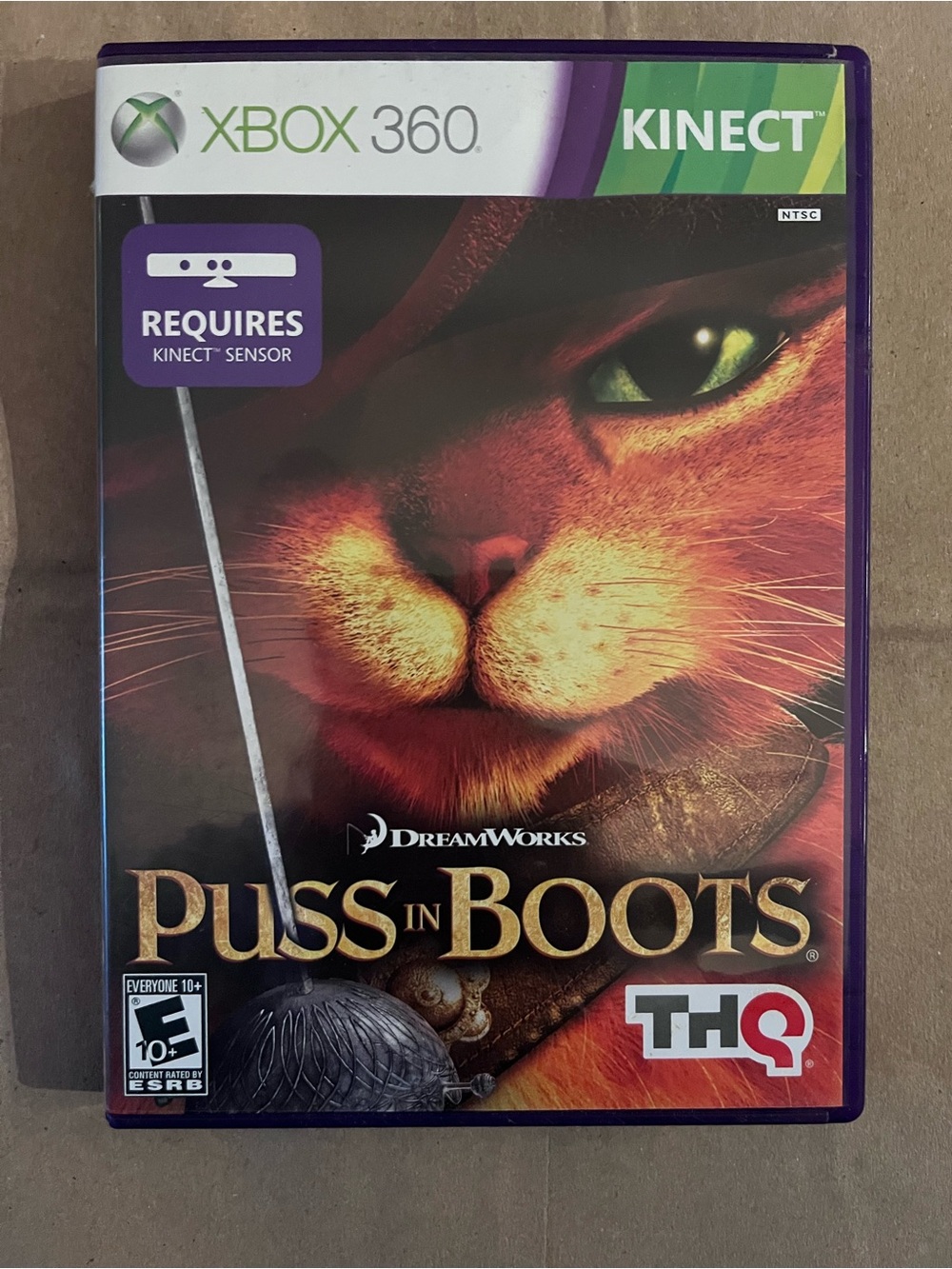 HQ Puss in Boots Xbox 360 Kinect Game - Orange & Purple Cover